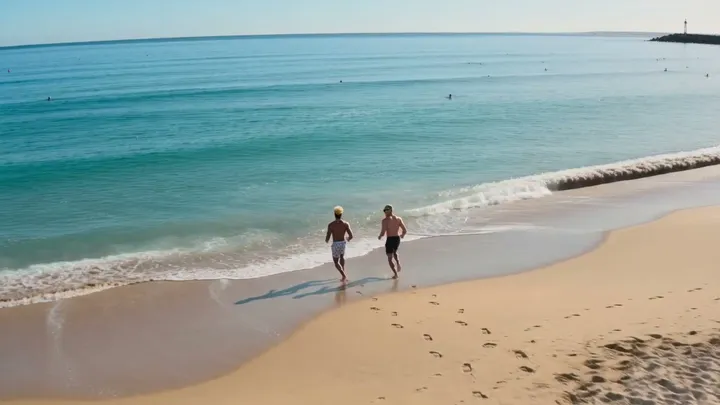 Two photos become a splashy day at the beach between friends.